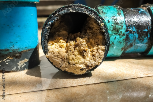 Fotografie, Obraz Embolism: A pipe clogged with thick fats, oil and grease