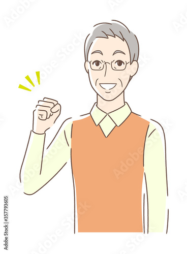 ガッツポーズする男性