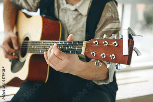 The guitarist plays the guitar