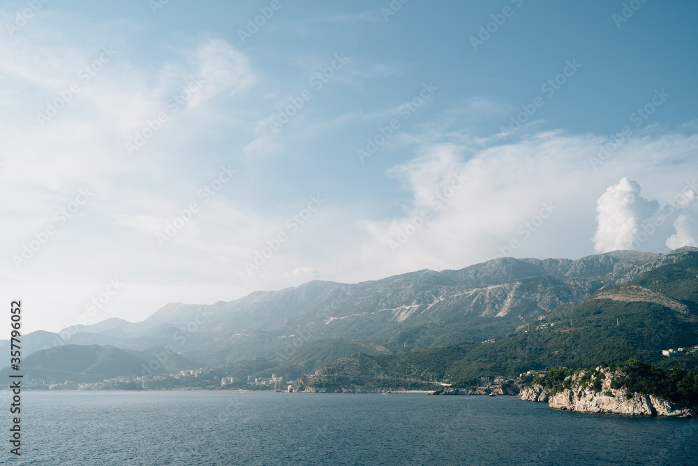 View from the sea to the coast of Budva, Becici and Rafailovici, in Montenegro.