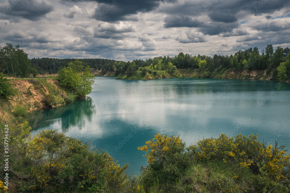 Turquoise lake Wapienniki near Sulejow, Lodzkie, Poland