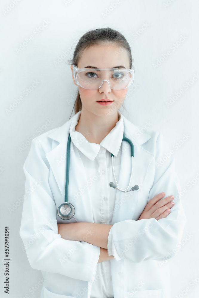 Portrait of Female Doctor With Stethoscope in Medical Uniform Arms Crossed Posing on Isolated Background, Smart Physician Doctor in Patient Clinic Hospital. Doctors Occupation/Medicine Healthcare Portrait of Female Doctor With Stethoscope in Medical Uniform Arms Crossed Posing on Isolated Background, Smart Physician Doctor in Patient Clinic Hospital. Doctors Occupation/Medicine Healthcare