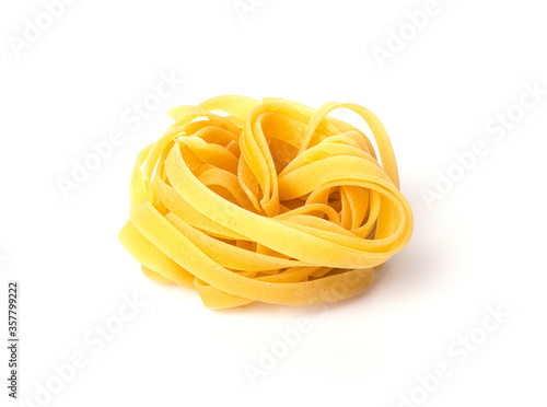 A portion of Italian tagliatelle pasta isolated on a white background