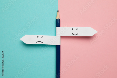 Foto Pencil - direction indicator - choice of sad or happy mood.