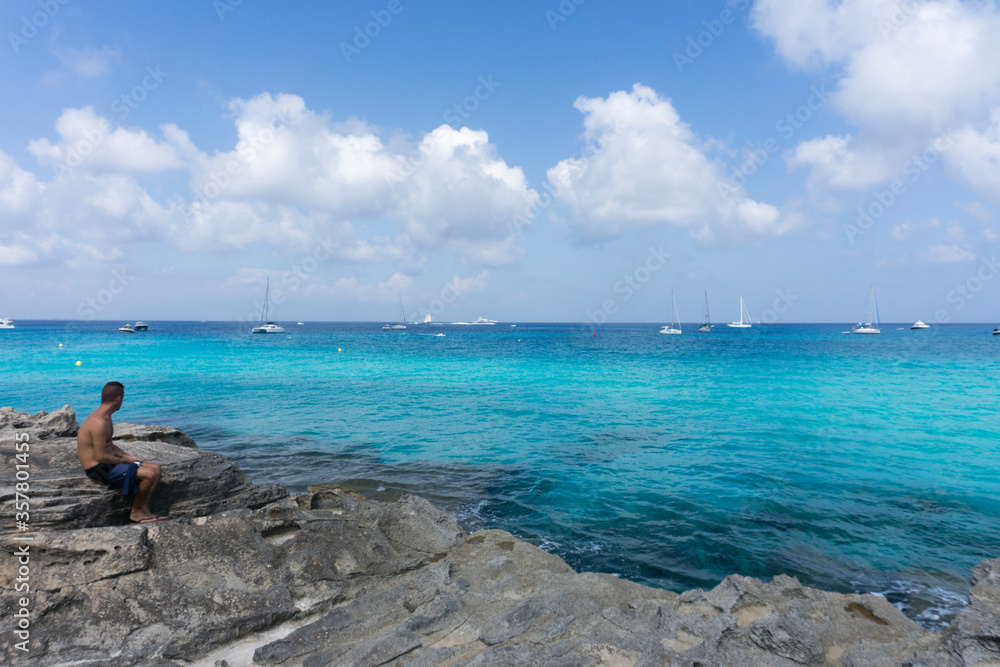 Turquoise water in Formentera Es Calo de San Agusti beach Balearic islands Spain on September 5, 2018