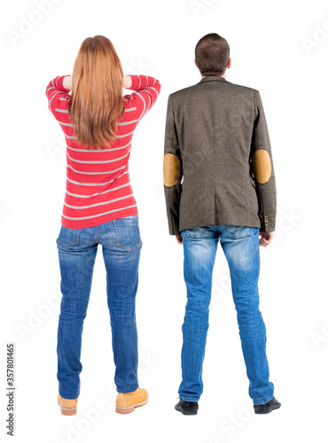 Back view couple in sweater. beautiful man and woman.