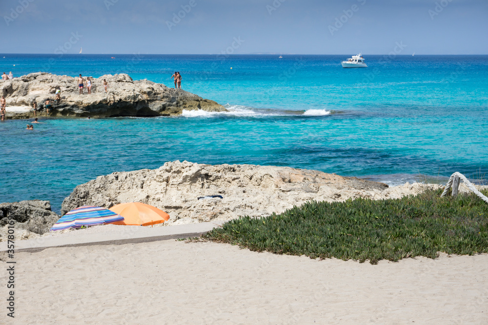 Turquoise water in Formentera Es Calo de San Agusti beach Balearic islands Spain on September 5, 2018