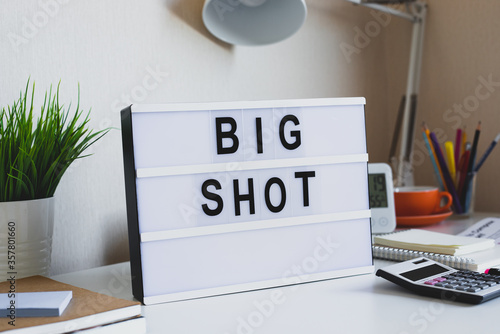 Big shot text on light box.investment profit with stock market