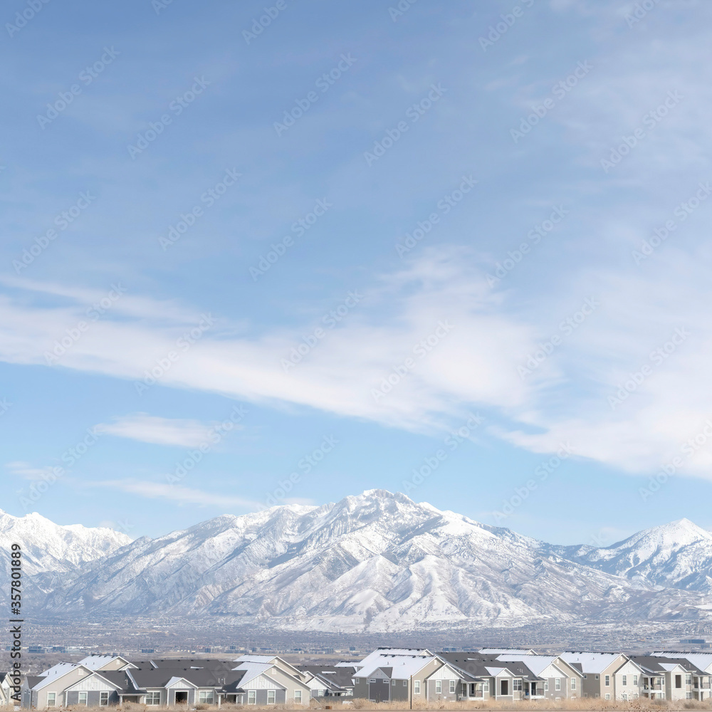 Square crop Striking Wasatch Mountains and South Jordan City in Utah during winter season