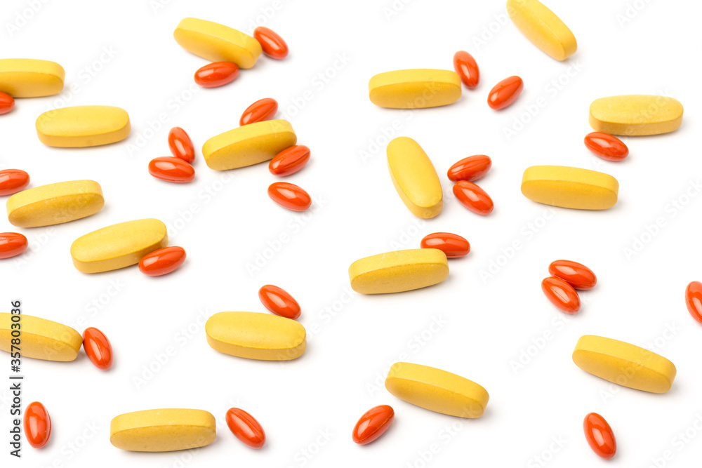 Multivitamin and mutimineral pills, nutritional Supplement on white background in close-up Multivitamin and mutimineral pills, nutritional Supplement on white background in close-up