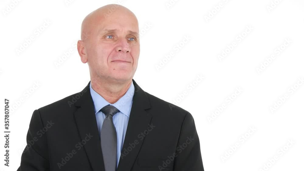 Portrait of a Confident Businessman with White Background in Company Office Portrait of a Confident Businessman with White Background in Company Office