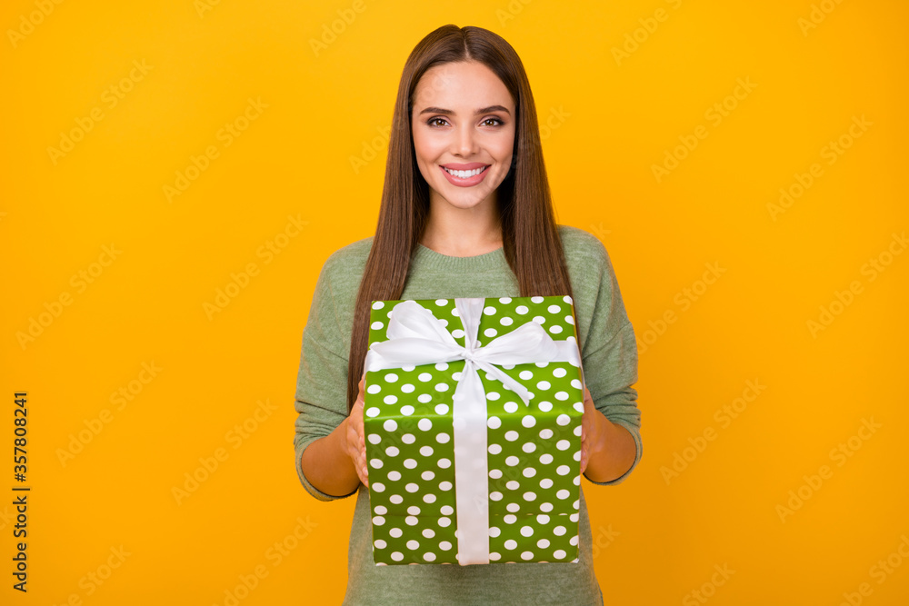 Portrait of content lovely pretty sweet cute girl hold big dotted gift she get on 14-february 8-march anniversary celebration wear good look sweater isolated over bright color background Portrait of content lovely pretty sweet cute girl hold big dotted gift she get on 14-february 8-march anniversary celebration wear good look sweater isolated over bright color background