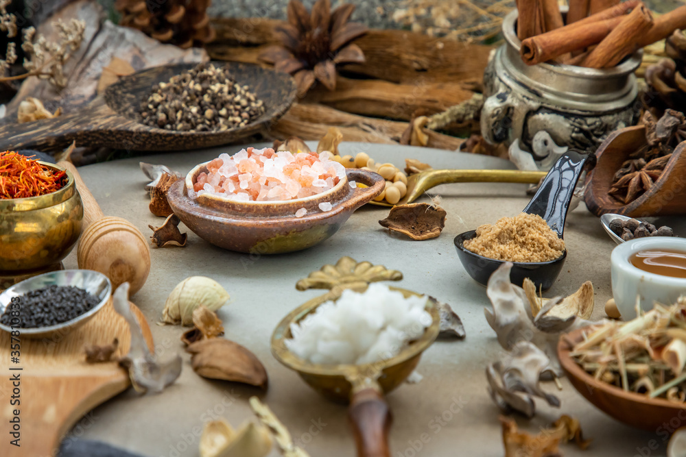 Various spices and herbs in rustic style with honey on balck background. Natural herbs medicine, Organic herbal and healthy concept, Selective focus. Various spices and herbs in rustic style with honey on balck background. Natural herbs medicine, Organic herbal and healthy concept, Selective focus.