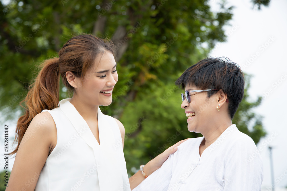 portrait of happy senior mother talking with daughter, happy family, togetherness concept portrait of happy senior mother talking with daughter, happy family, togetherness concept