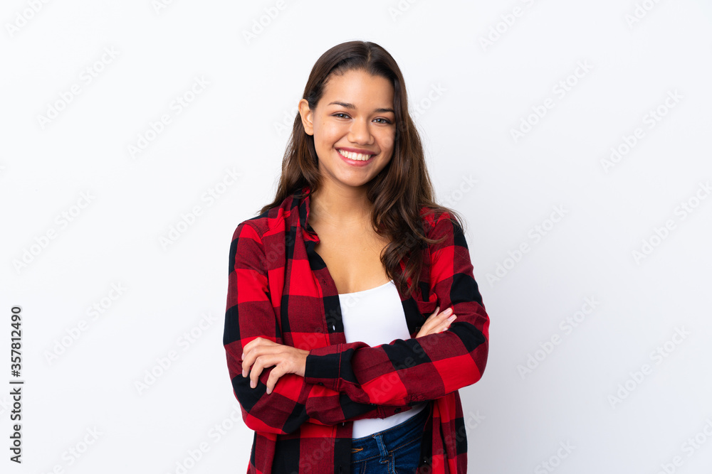 Young Colombian girl over isolated white background laughing Young Colombian girl over isolated white background laughing