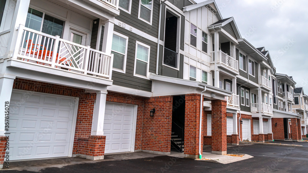 Panorama crop Row of new built three story town houses