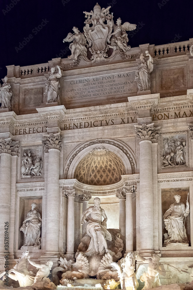 Rome Italy, a partial night view of  the famous trevi fountain with impessive illumination