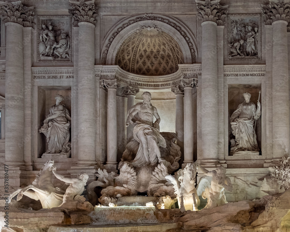 Rome Italy, a partial night view of  the famous trevi fountain with impessive illumination