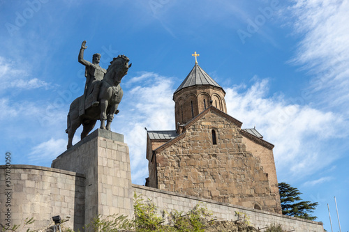 Metekhi church and the statue of King Vakhtang Gorgasali in the old town of Tbilisi, the capital of Georgia photo