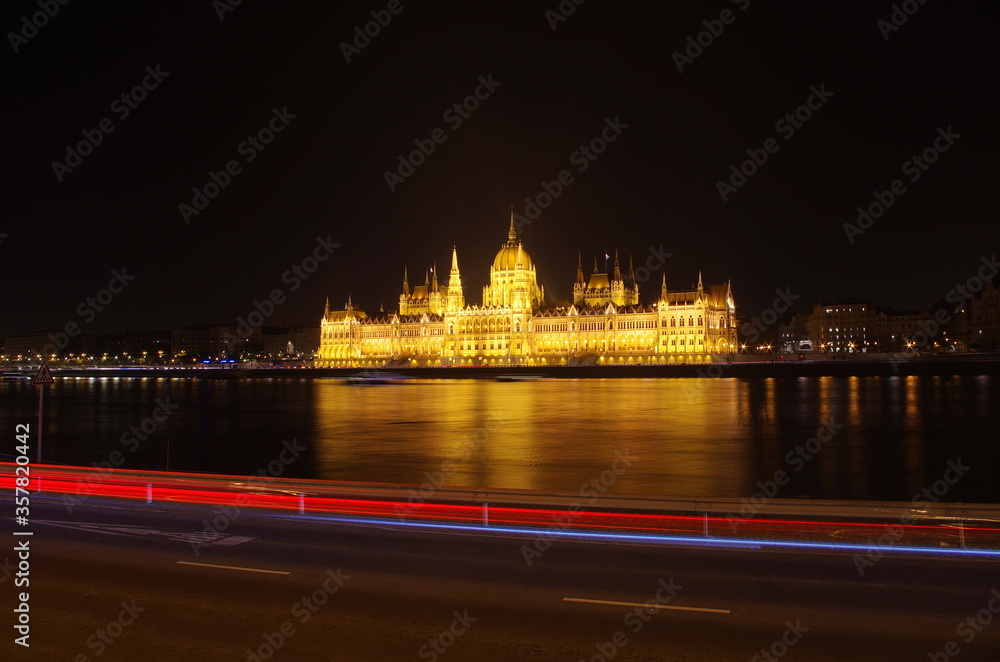 Budapest parliament building at night, long exposure. Hungarian Parliament building and Danube River in the Budapest city at night. Neo-gothic architecture, Budapest's tourist attraction