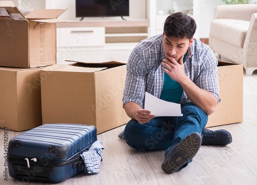 Unemployed man receiving foreclosure notice letter