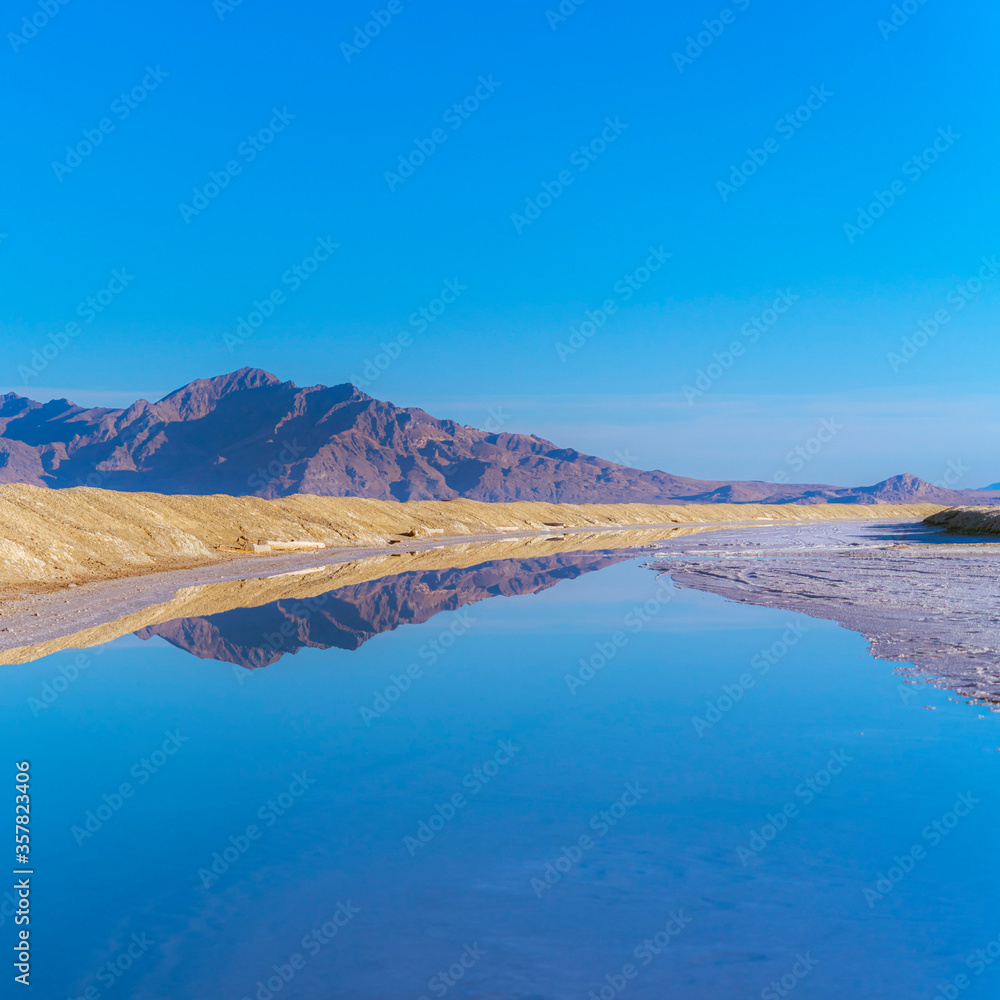 Square crop Reflection in still water at Bonnievale Salt Flats