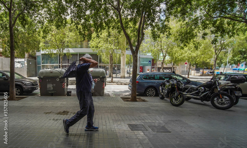 Coronavirus Crisis. People on street during COVID-19 pandemic. Spain