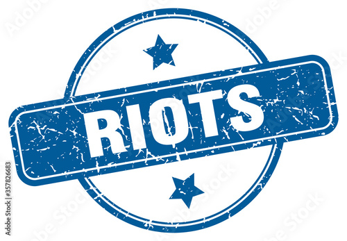 riots grunge stamp. riots round vintage stamp