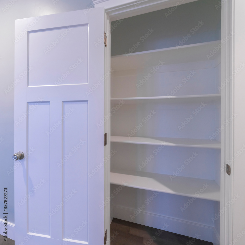 Square Open empty fitted cupboard or wardrobe interior Square Open empty fitted cupboard or wardrobe interior