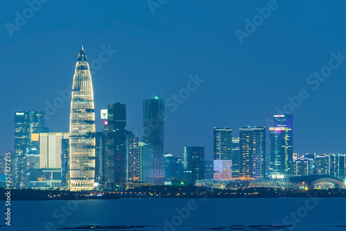 Skyline of Shenzhen city  China at night. Viewed from Hong Kong border