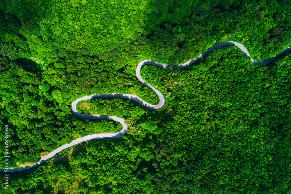 Fototapeta premium Aerial view over mountain road