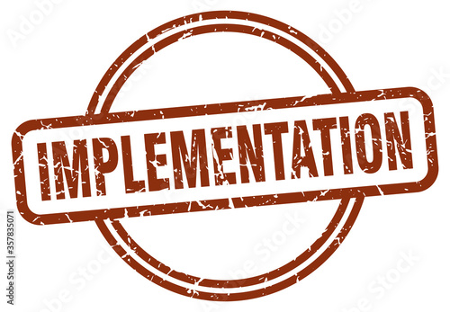 implementation grunge stamp. implementation round vintage stamp