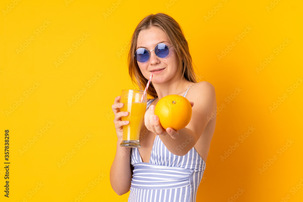 Teenager Ukrainian girl in swimsuit and holding a cocktail Teenager Ukrainian girl in swimsuit and holding a cocktail