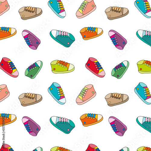 Seamless pattern children shoes multicolored sneakers on a white background vector