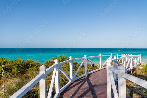 A nice wooden walking path to the Caribbean sea on a small island next to Cuba © Lukas