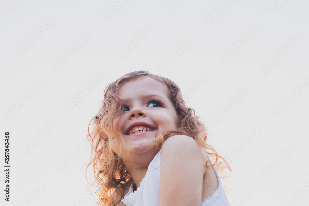 Portrait of cute curly smiling preschool girl Portrait of cute curly smiling preschool girl
