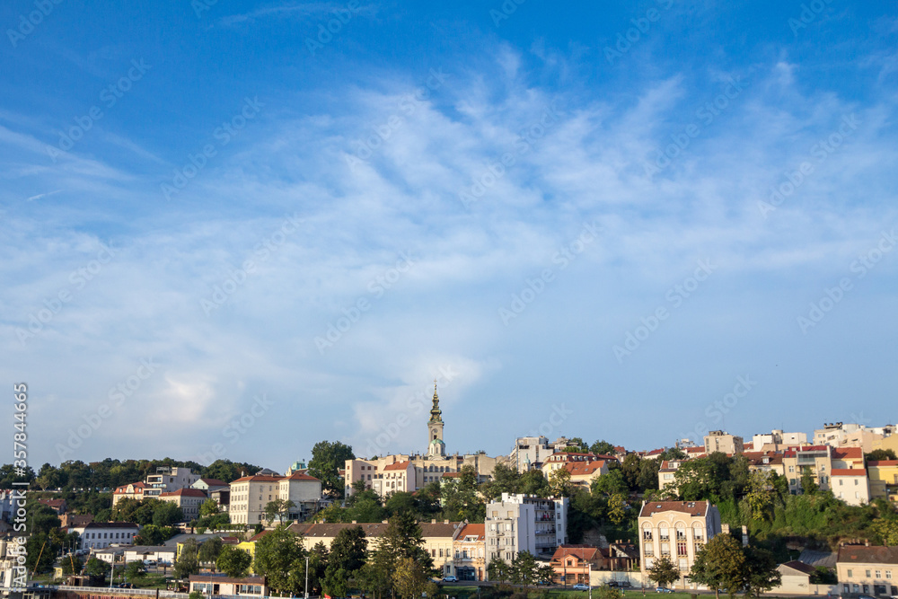 Panorama of the old city of Belgrade with a focus on Saint Michael Cathedral, also known as Saborna Crkva, with its iconic clocktower seen from afar. belgrade is the capital city of Serbia.