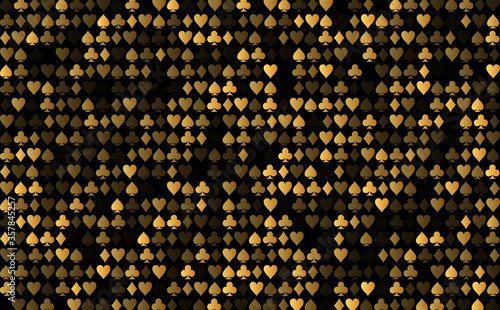 Shiny golden background from symbols of playing cards for a casino.