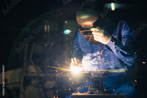 worker welding steel