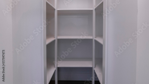 Panorama crop Empty interior of a walk-in closet interior