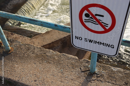 no swimming symbol at bridge spot