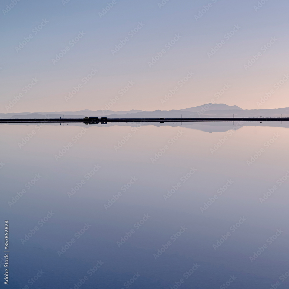 Square Perfect reflection of clear sky in salt lake
