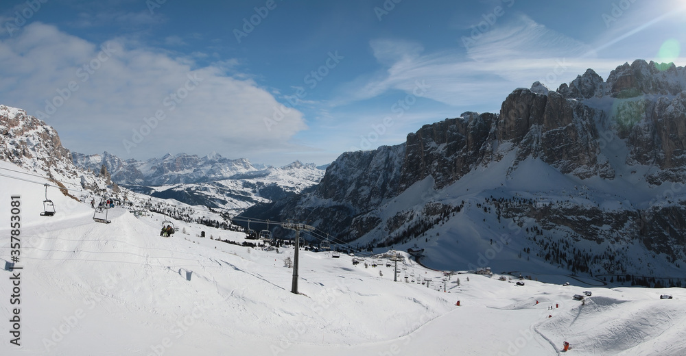 Panoramic winter view of Sella Group mountains and Alta Badia ski area. Sella Ronda. Dantercepies. Dolomites. South Tirol. Italy.