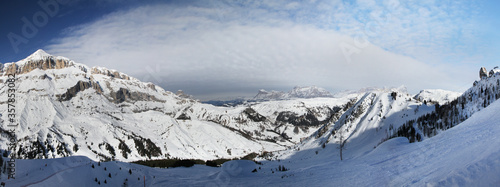 Panoramic winter view of Sella Group mountains with Arabba ski area from Porta Vescovo station. Sella Ronda (Sella Group) Dolomite Alps. Trentino-Alto Adige. Italy.