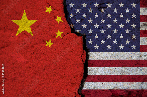 Wallpaper Mural Concept of tensions in foreign relations between USA and China. A large crack in the wall with according country flags. Torontodigital.ca