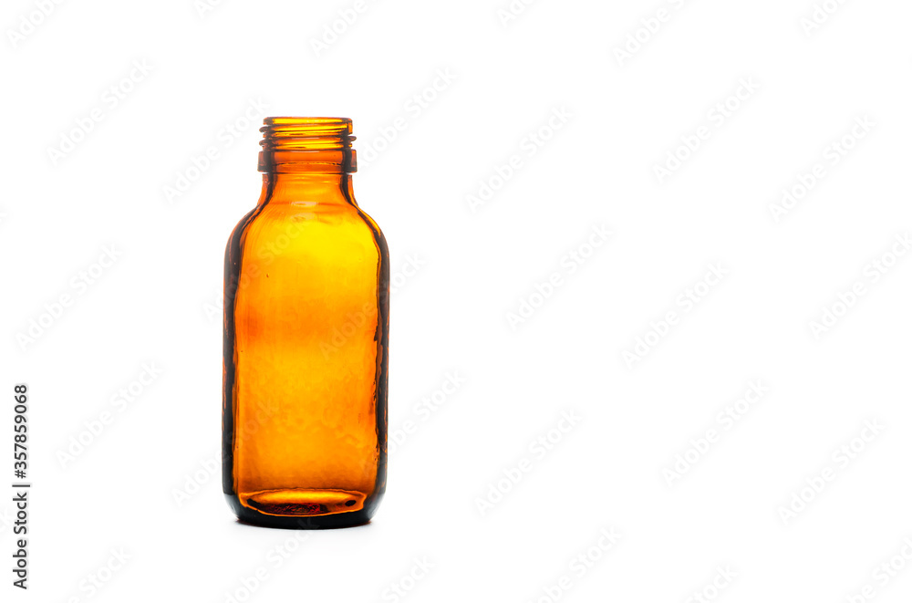empty brown old glass oil bottle on a white background