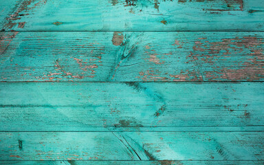 Weathered blue wooden background texture. Shabby wood teal or turquoise green painted. Vintage beach wood backdrop.