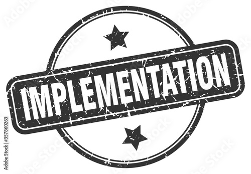 implementation grunge stamp. implementation round vintage stamp