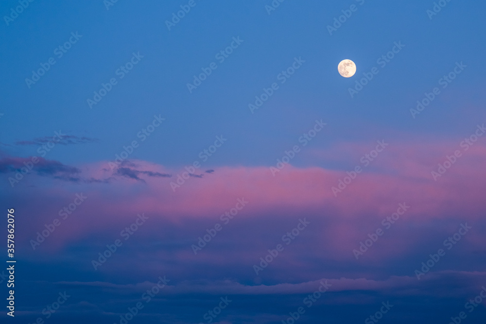 Beautiful moon in the dusk. Landscape format. Beautiful moon in the dusk. Landscape format.