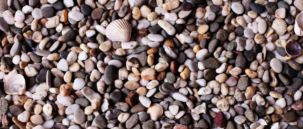 Fototapeta premium Texture background of small pebbles of different colors
